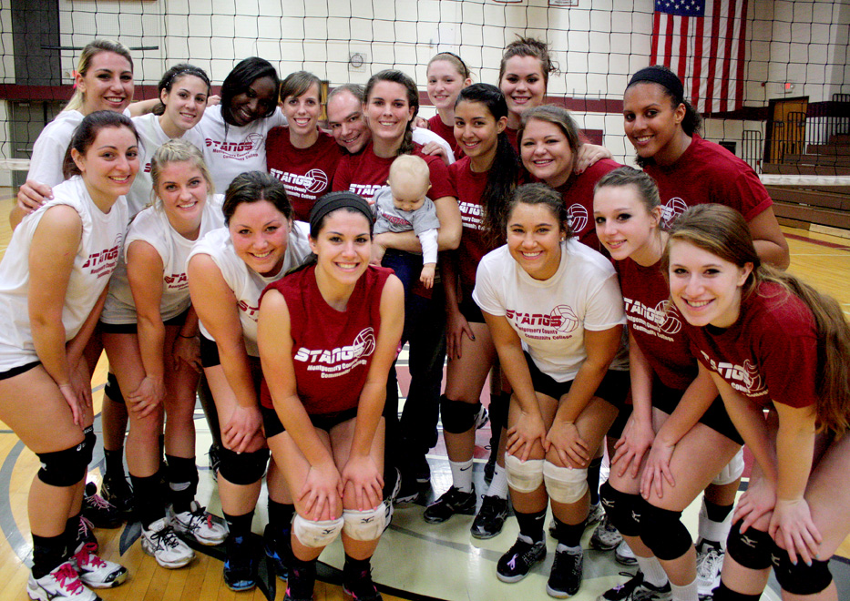 Volleyball Alumnae Help Unveil Championship Banners